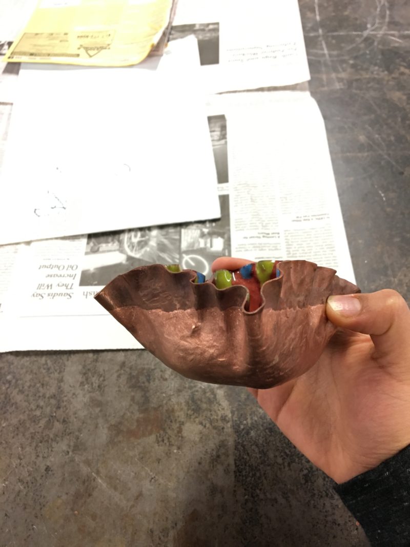 The outside of my cup: the bottom half is light pink and the top is coppery brown.