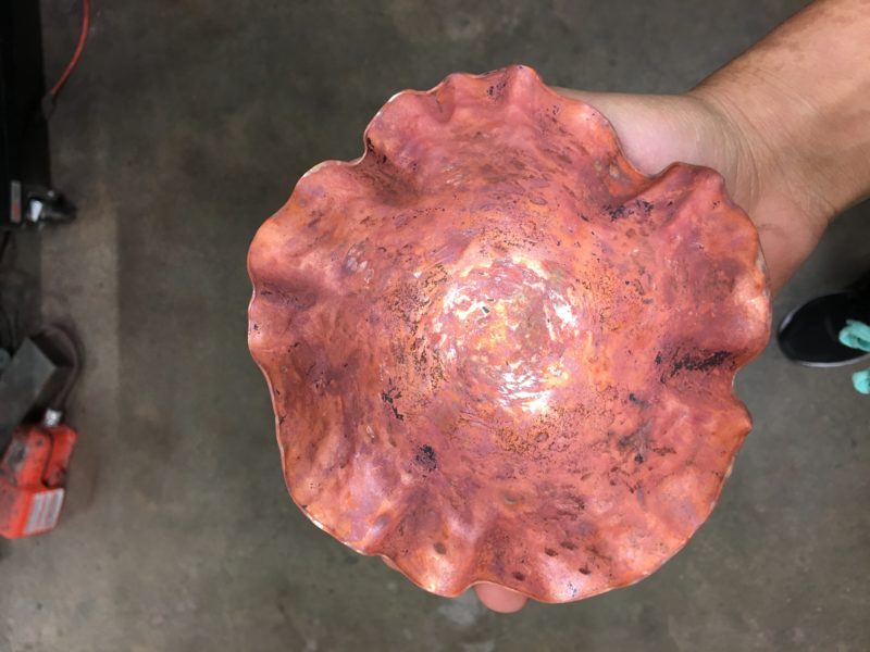 My cup with walls beginning to build up around all sides. It's red this time, since the soot from annealing has fallen off.