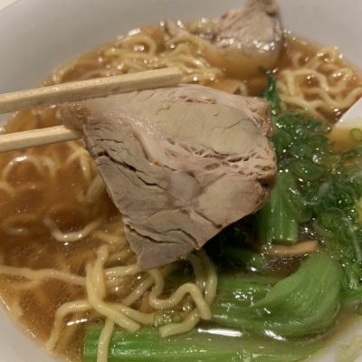 closeup of meat in central ramen