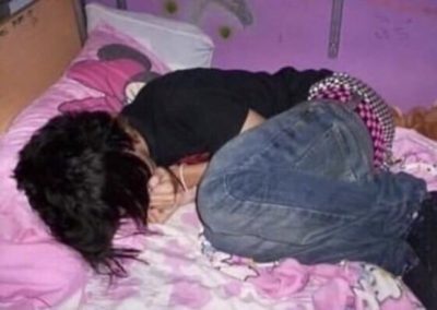 scene kid crying on a bed