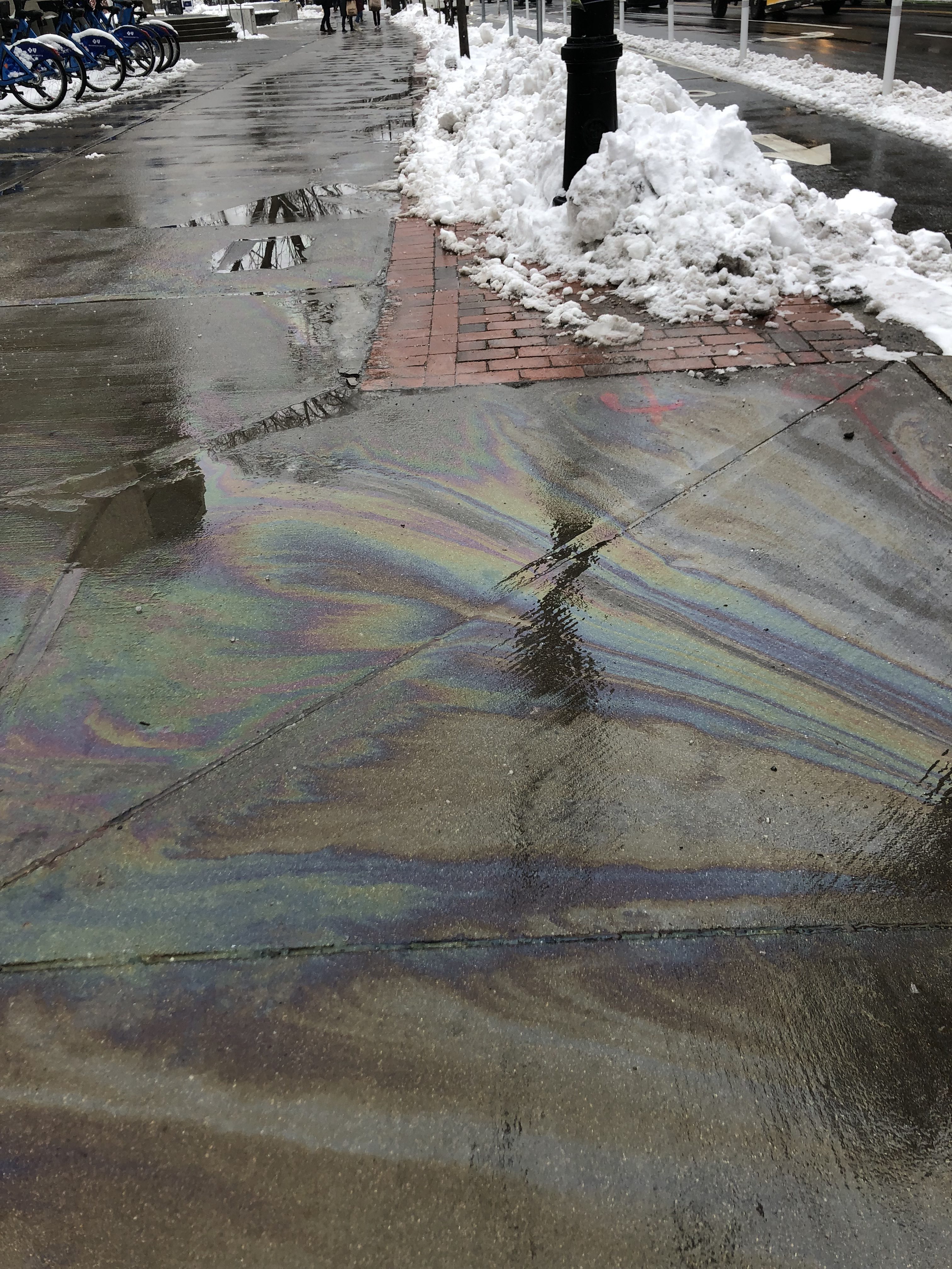 rainbow pattern on the pavement from the rainbow