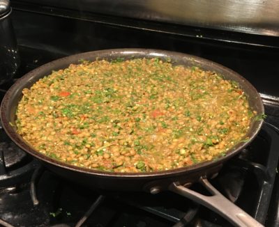 A pot of spinach-and-tomato dal.