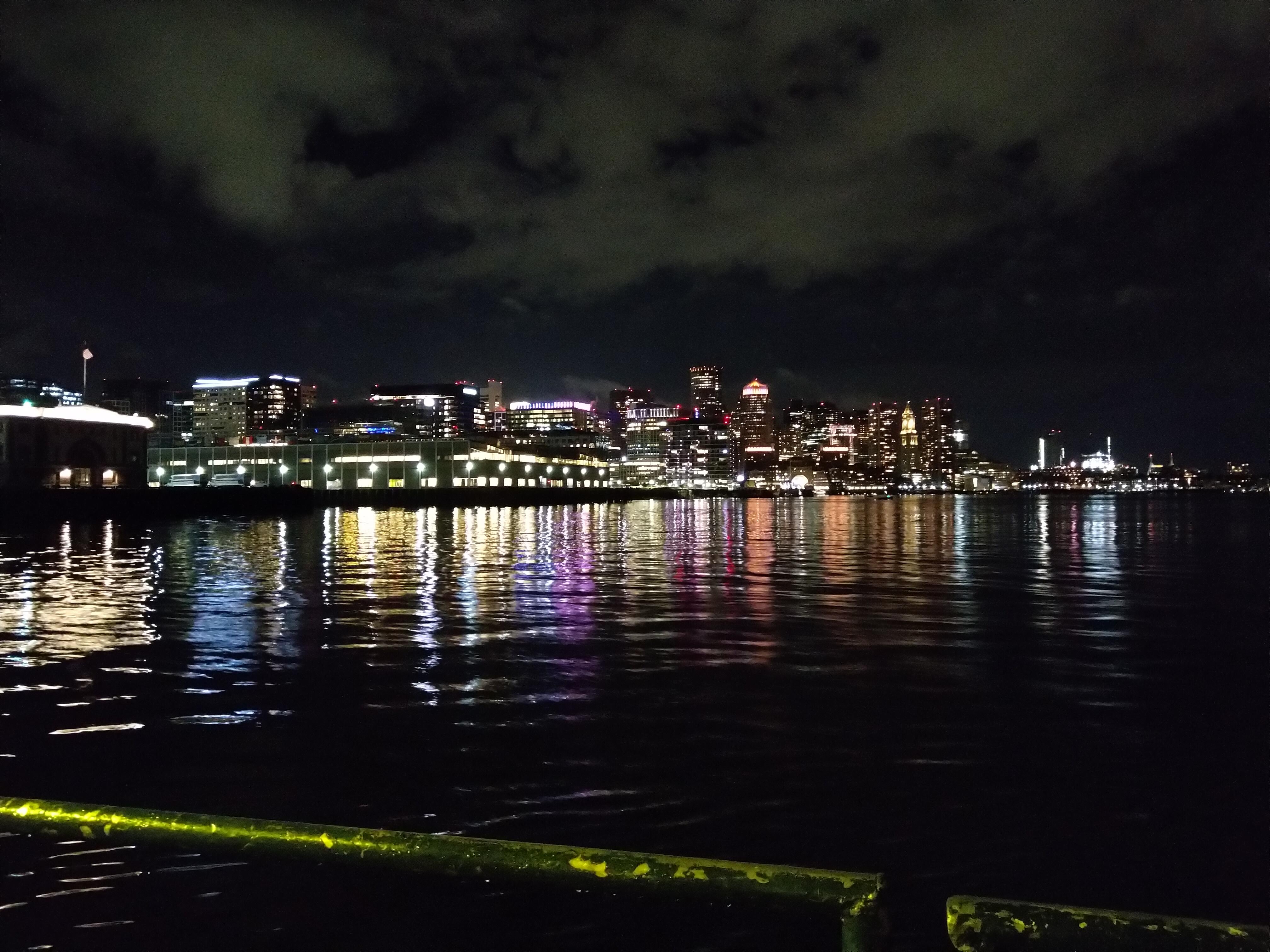 The Boston skyline as viewed from a boat.