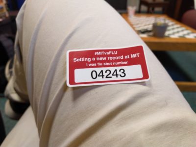 my flu shot sticker, saying that my flu shot number is 4243