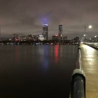 picture of the Harvard Bridge and the Charles River at night