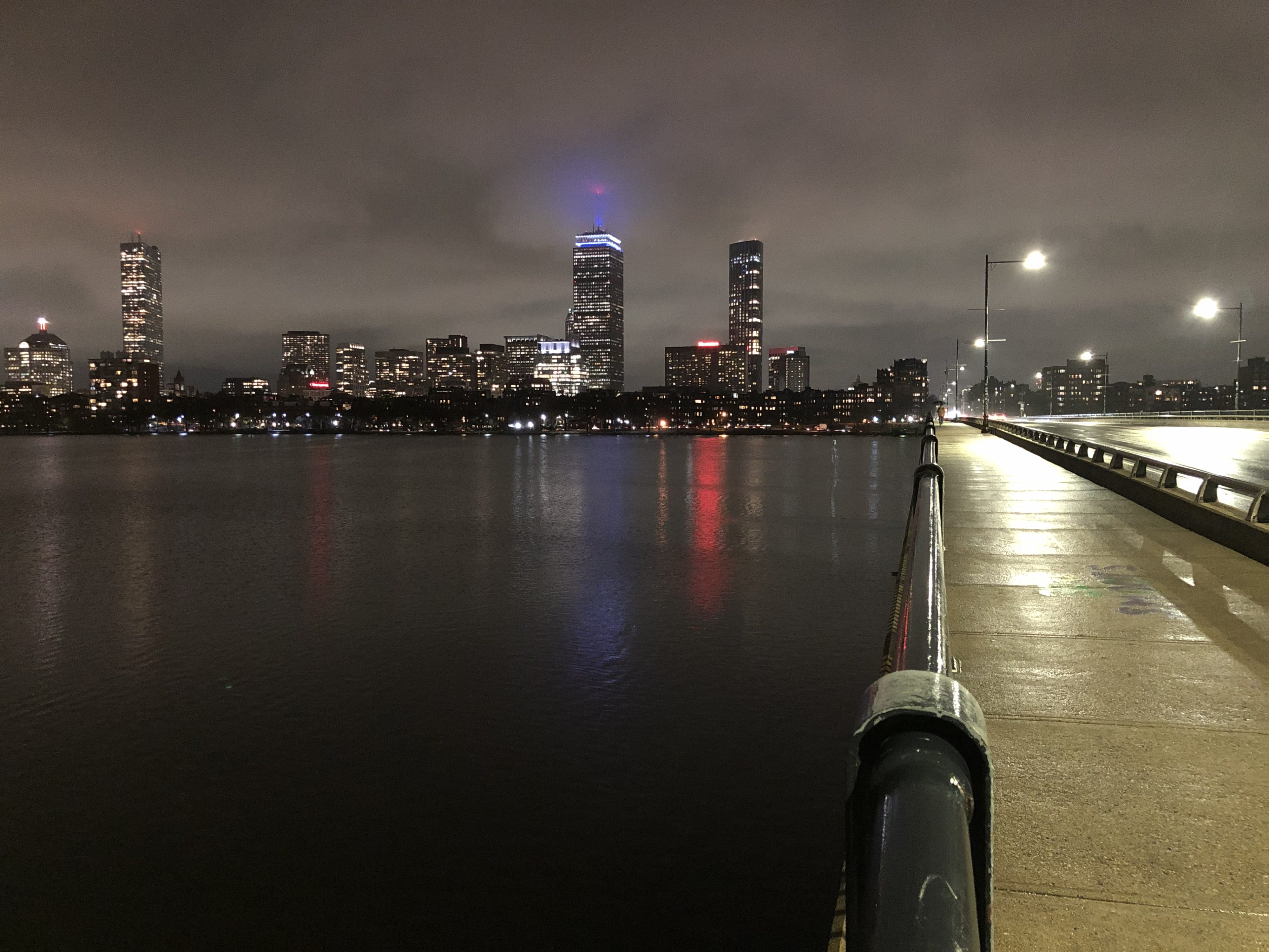 picture of the Harvard Bridge and the Charles River at night