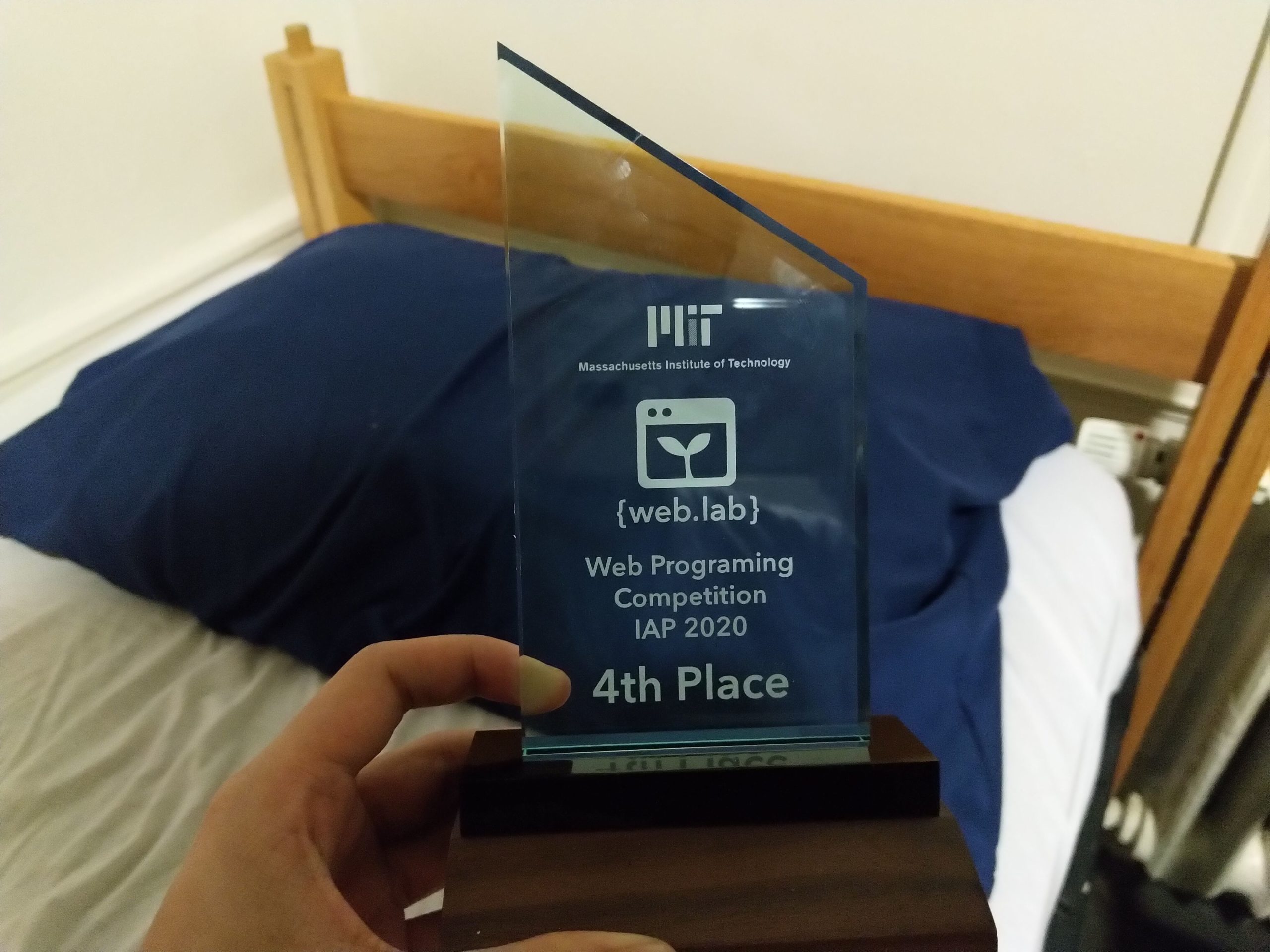 a transparent plaque. after the mit logo and the weblab logo, it reads web programing competition iap 2020 4th place