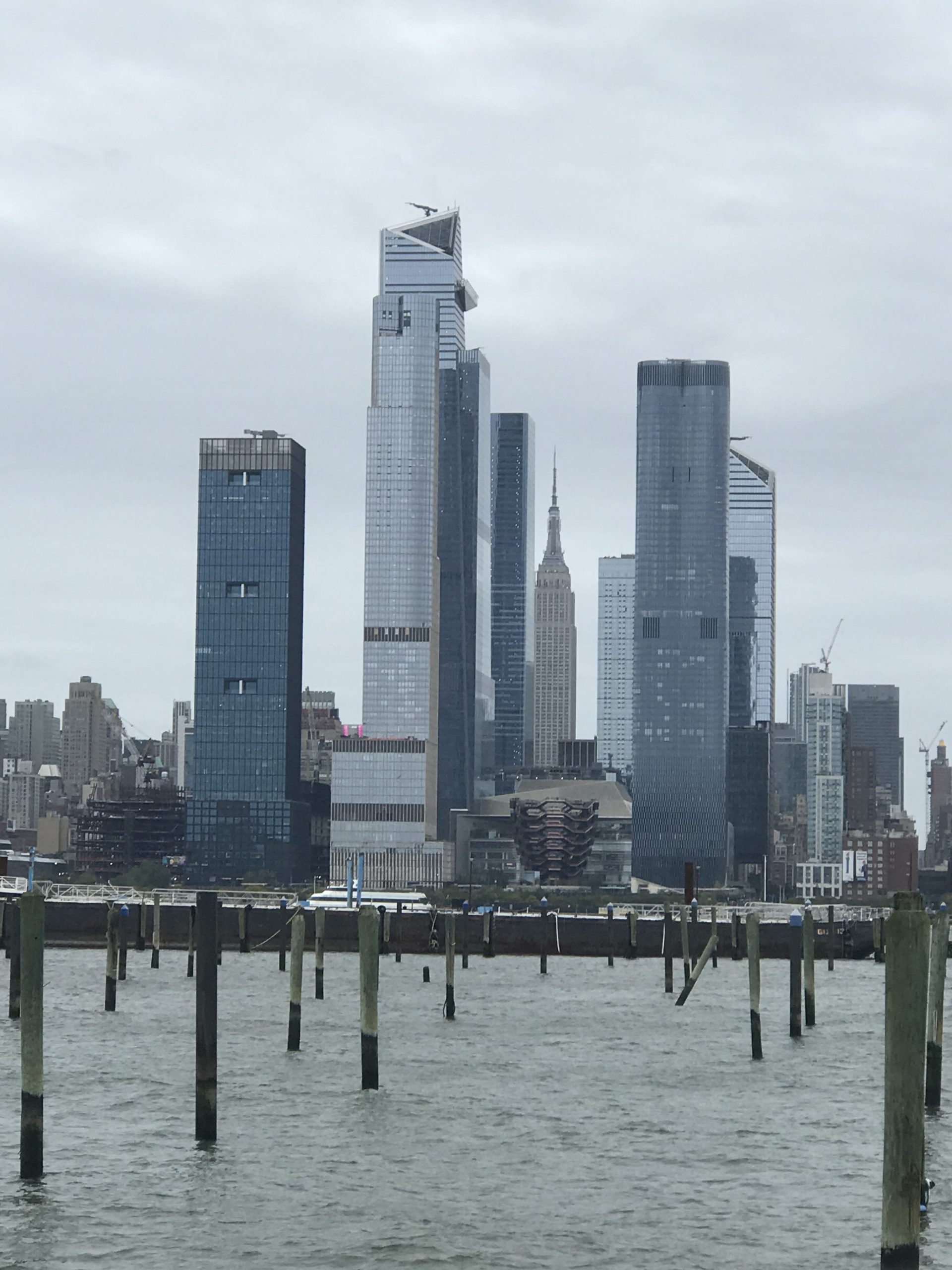 Yi's view of a city skyline while reading applications while commuting.