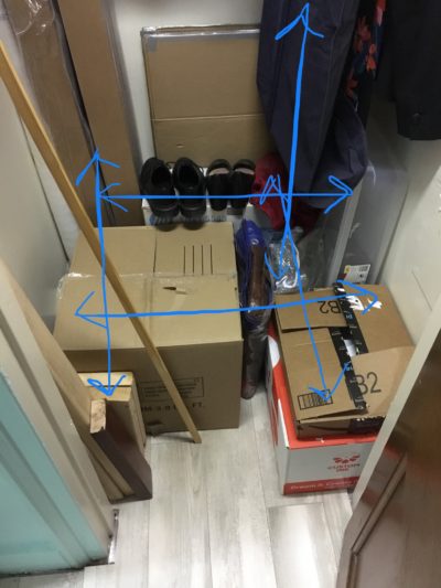 My smallish and tightly packed closet. I've drawn five arrows on it showing which directions are as tightly packed as possible.