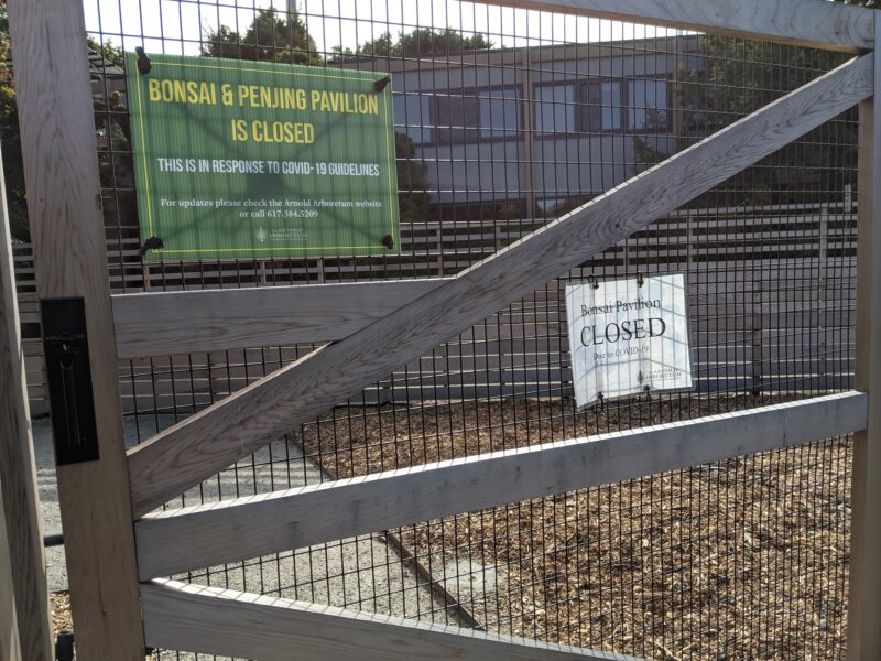 signs noting the bonsai pavillion is closed