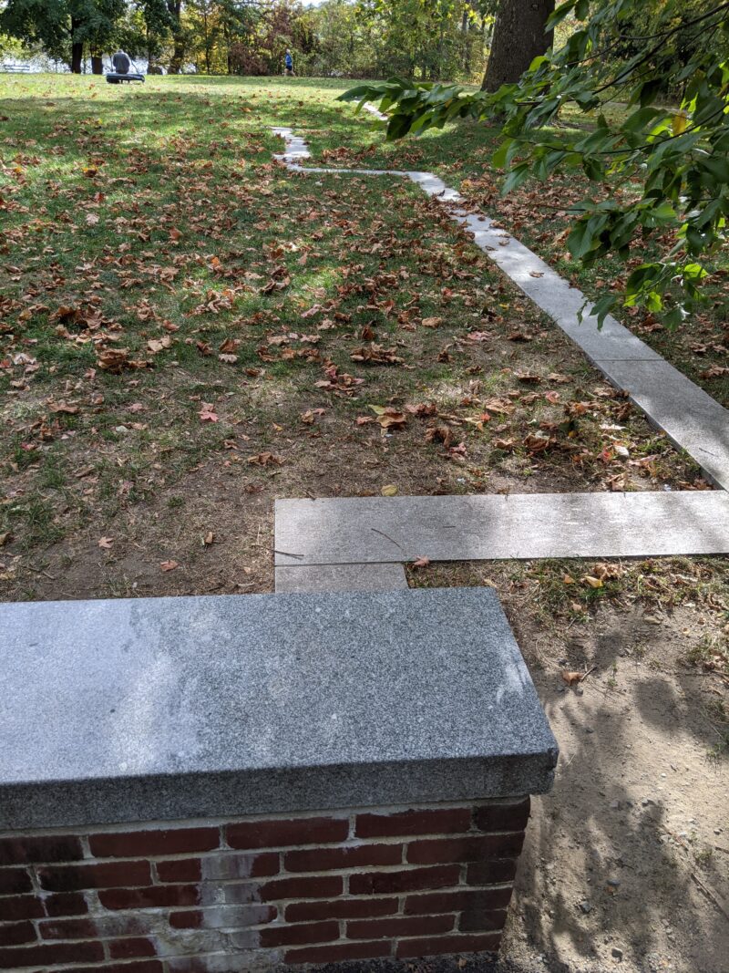 stones in the ground tracing a foundation