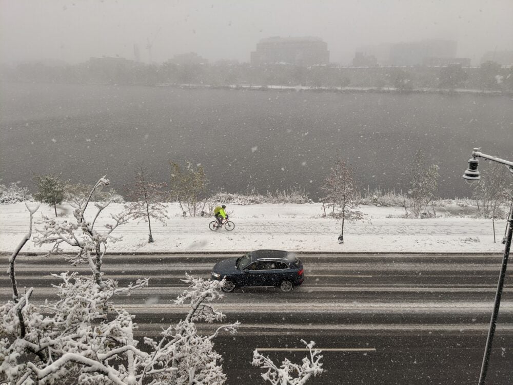 snow on memorial drive, looking out at the charles river