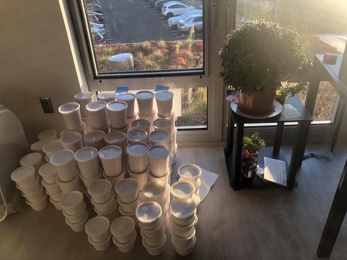 stacks of containers in front of the window