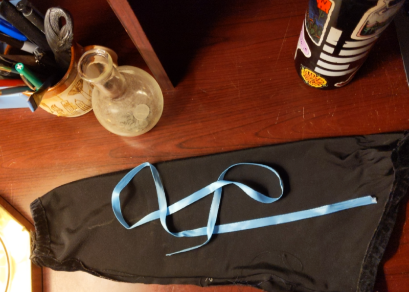 velvet sleeve and blue ribbon
