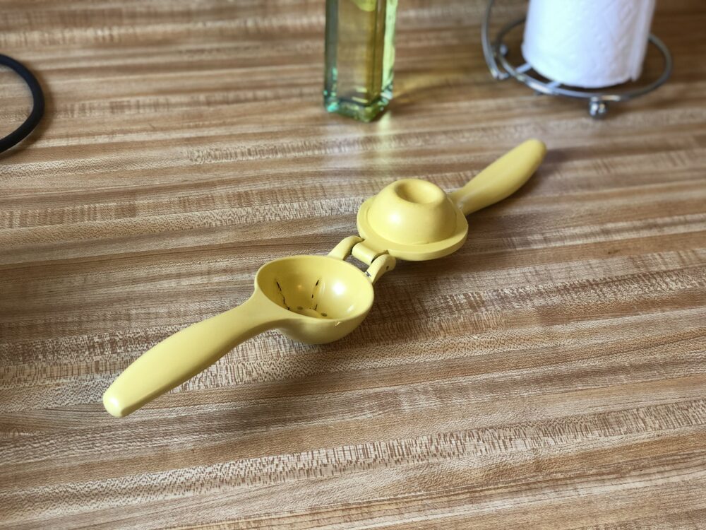 a photo of a lemon squeezer