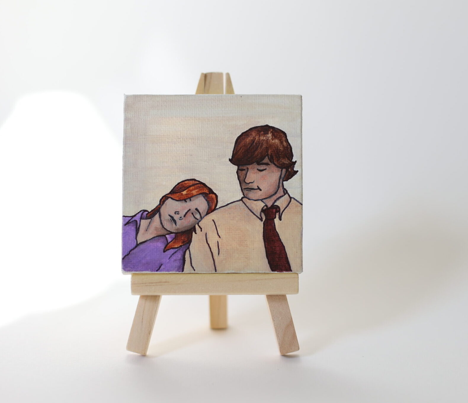 small painting of jim and pam from the office