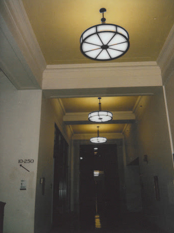 picture of a hallway with a signn that says 10-250 painted on the wall