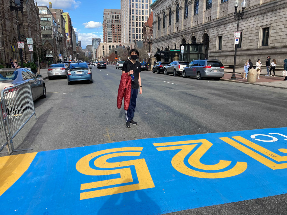 alan standing behind a painted strip on the road