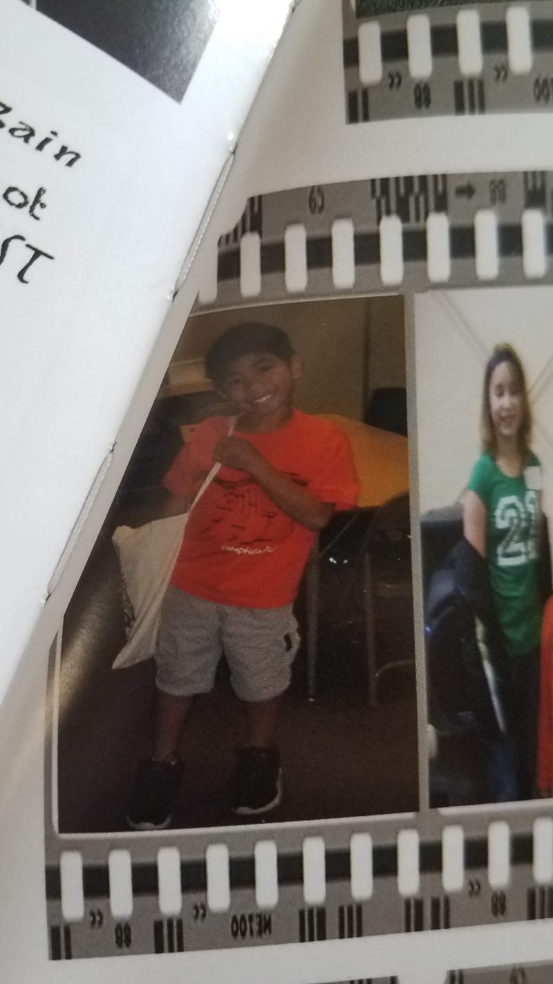 paolo in middle school with orange shirt