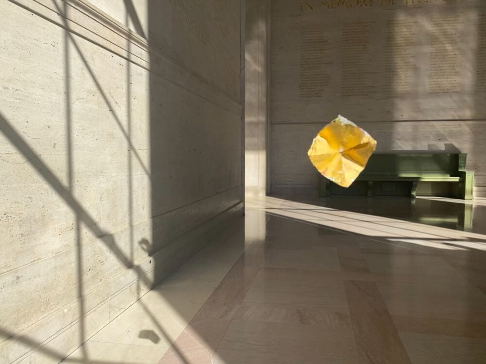 golden foil floating in an MIT lobby