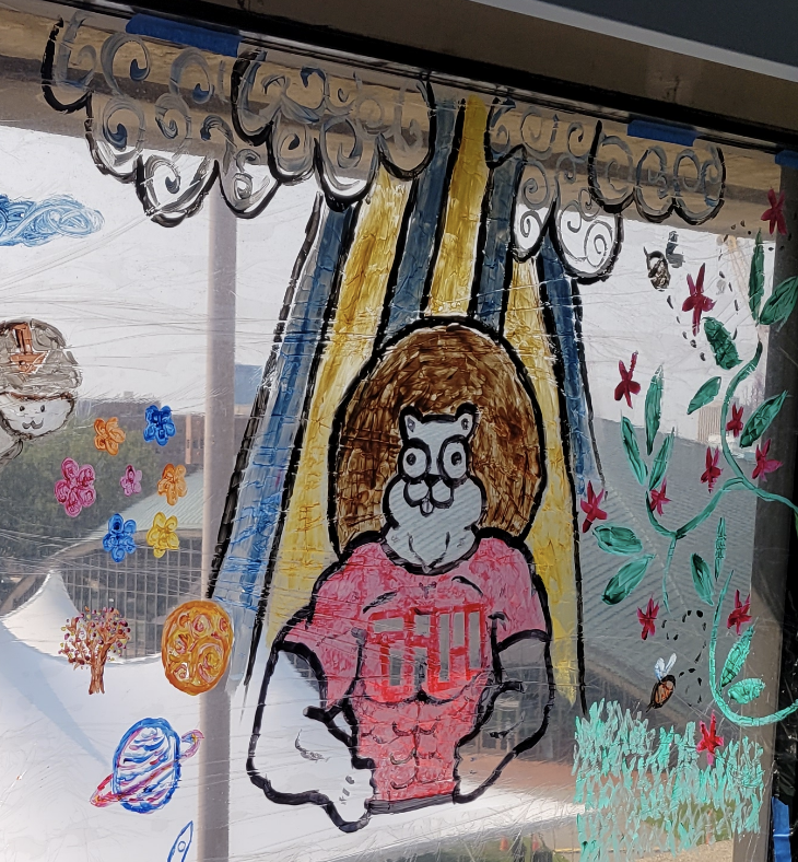 a window painting of swole tim