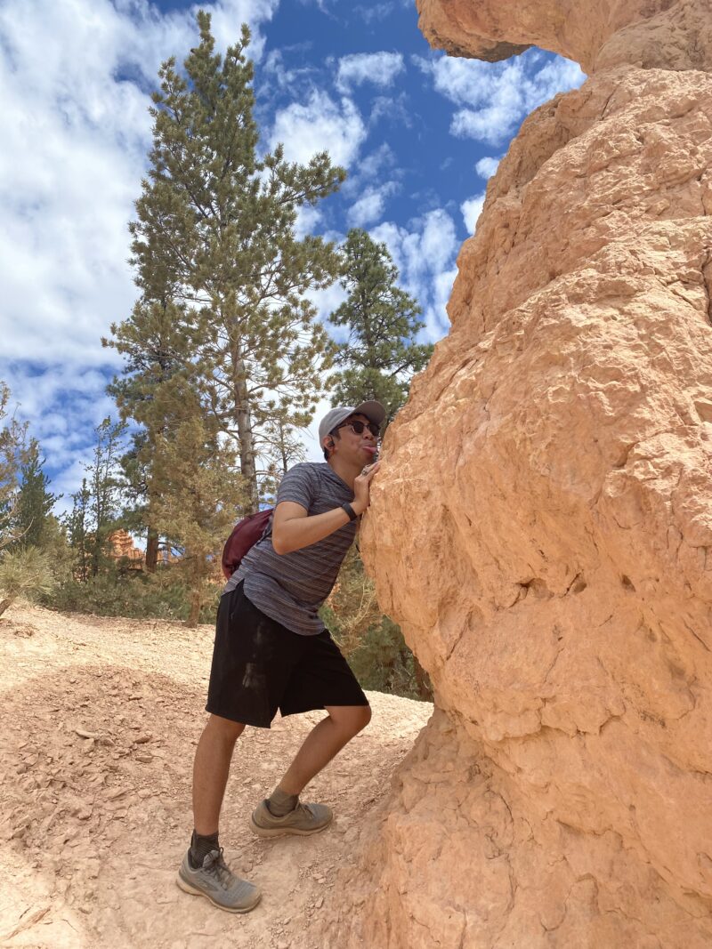 someone licking a rock