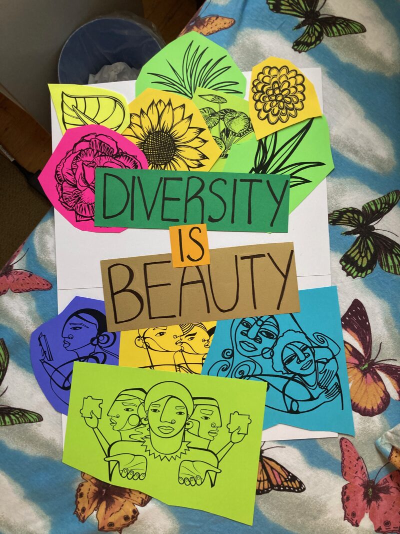 A mockup of my poster: each element is roughly cut out and placed on a background without being taped down.