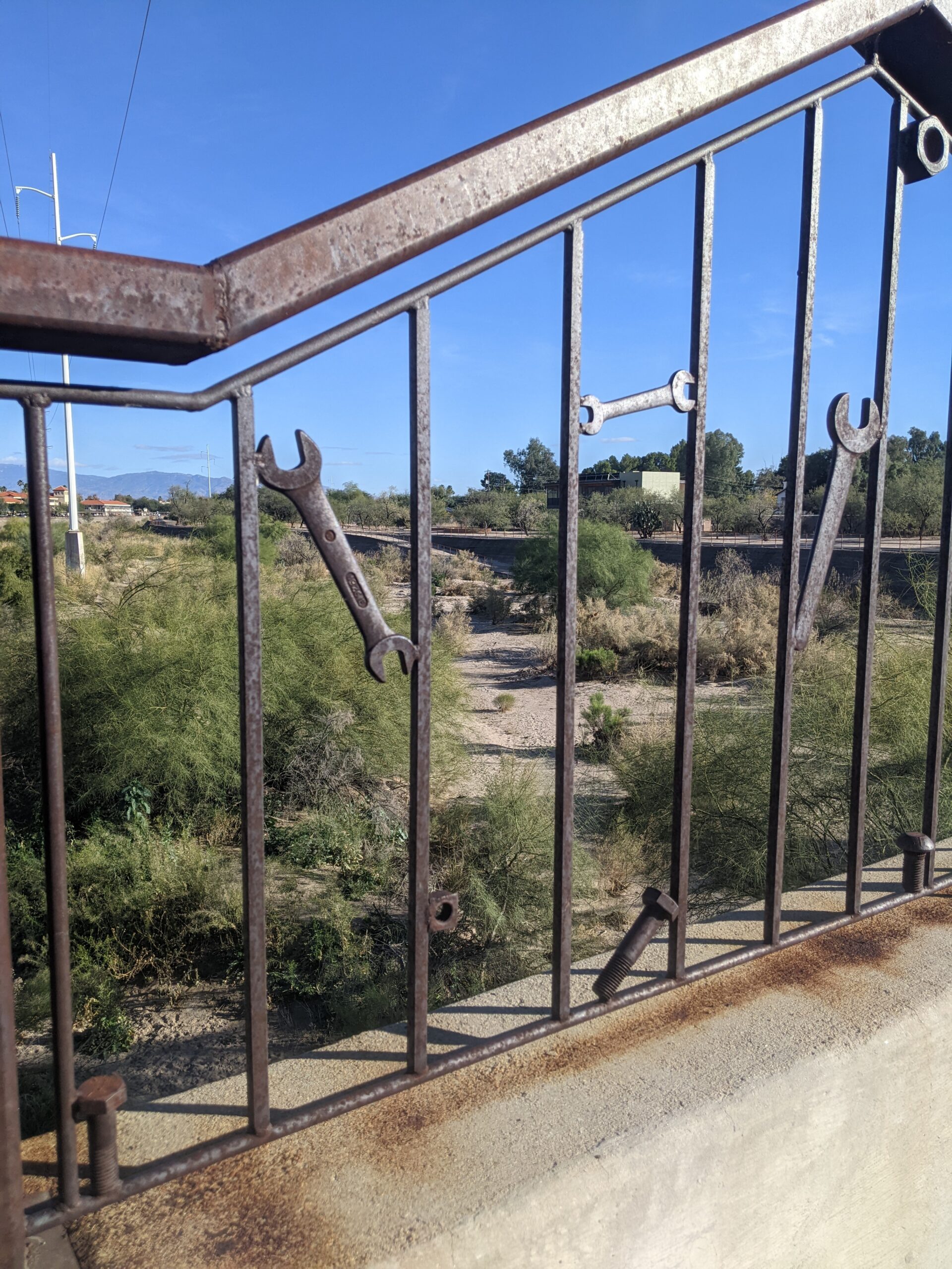 fence with wrenches welded into bars