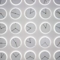 a wall of clocks