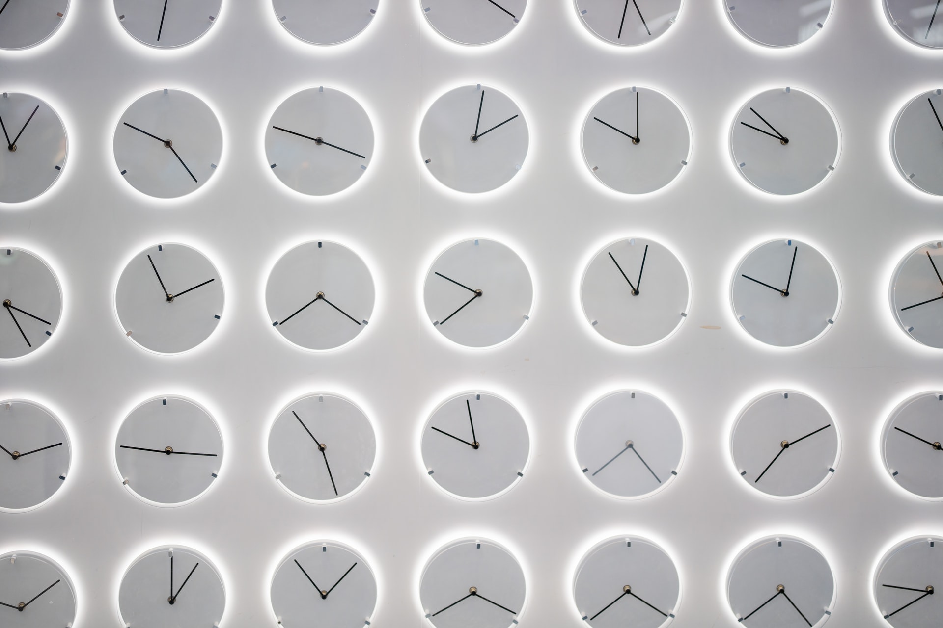a wall of clocks