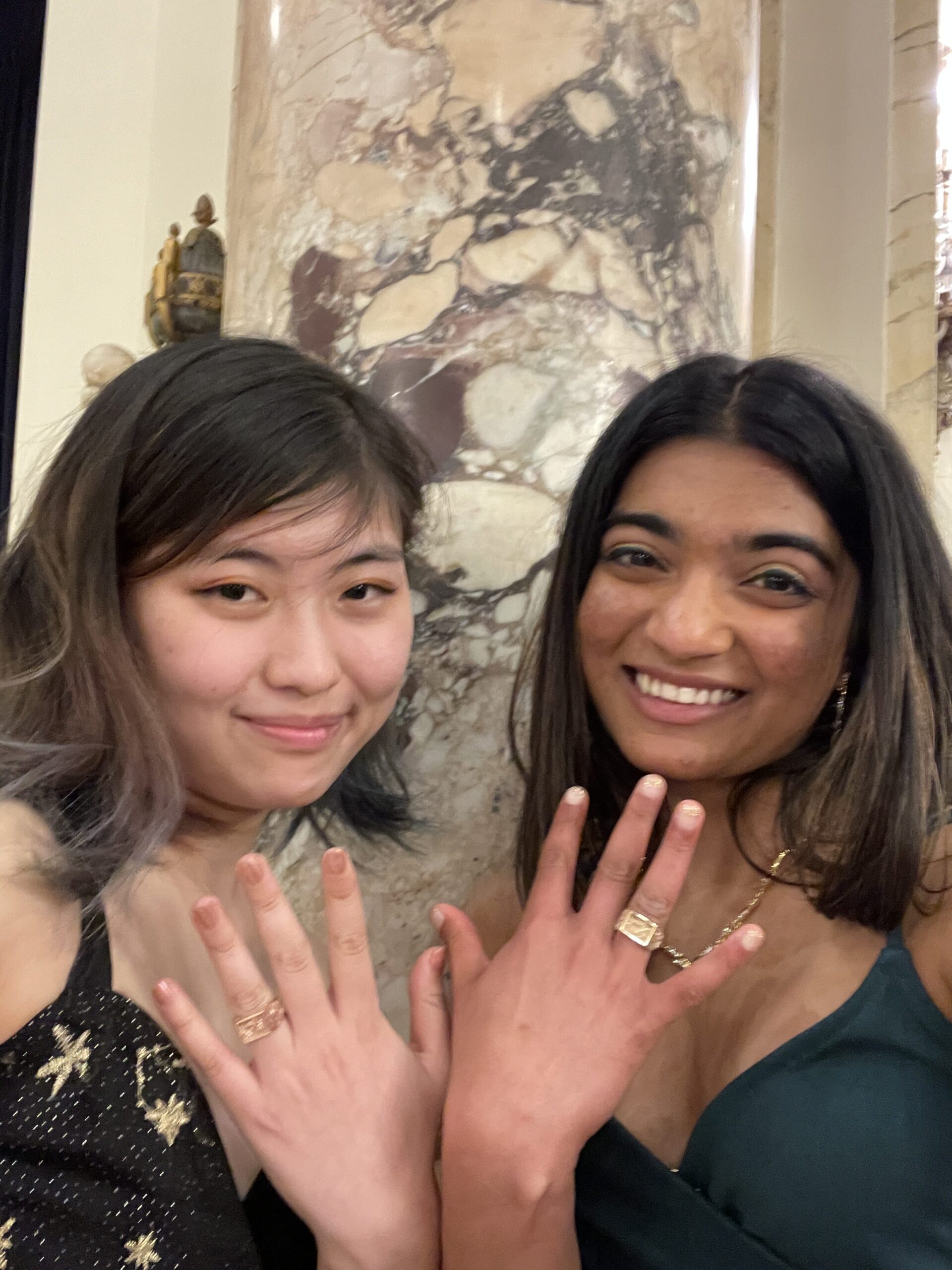 Ria '24 and I showing off our rings!
