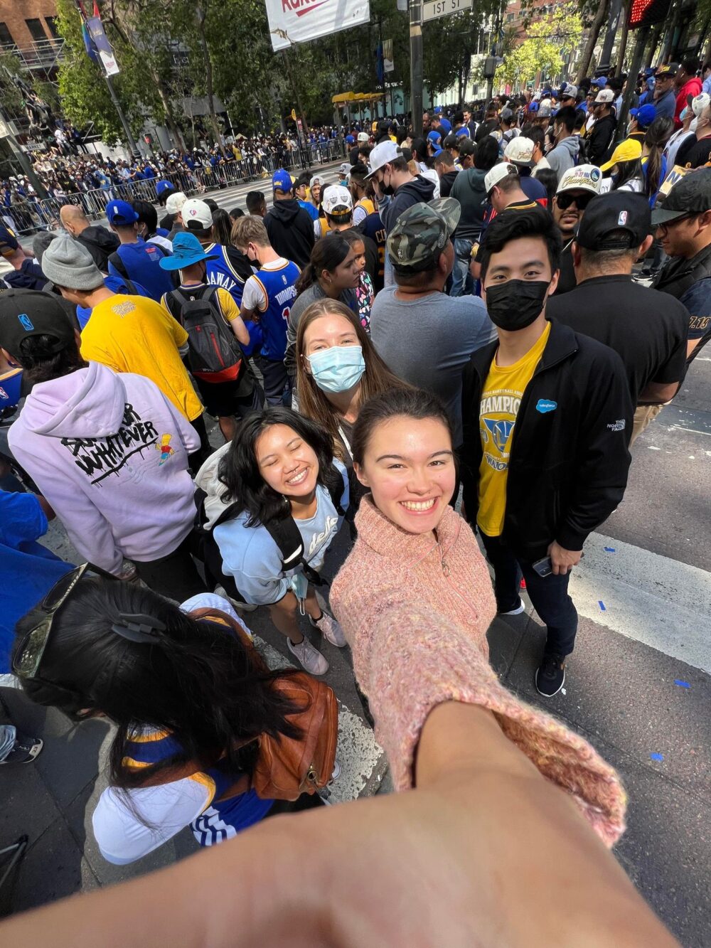 selfie of me with three other interns in crowded street