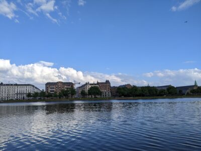 lake with some houses