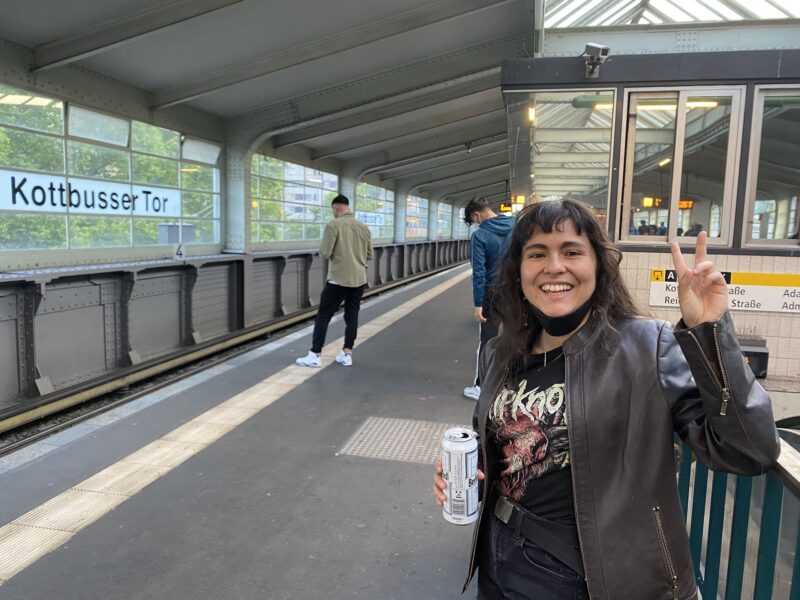amber smiling at a subway station