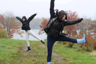 two girls jumping