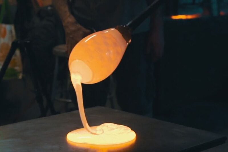 Hot glass dripping onto a surface