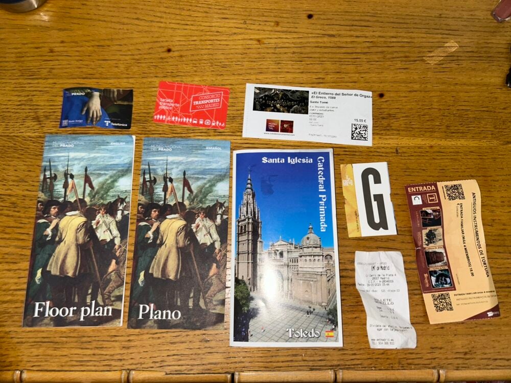 photo of various tickets and info books on a desk; descriptions in the blogpost below