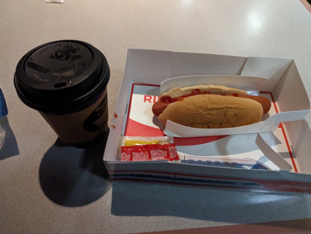 hot dog and cup. it looks unappetizing