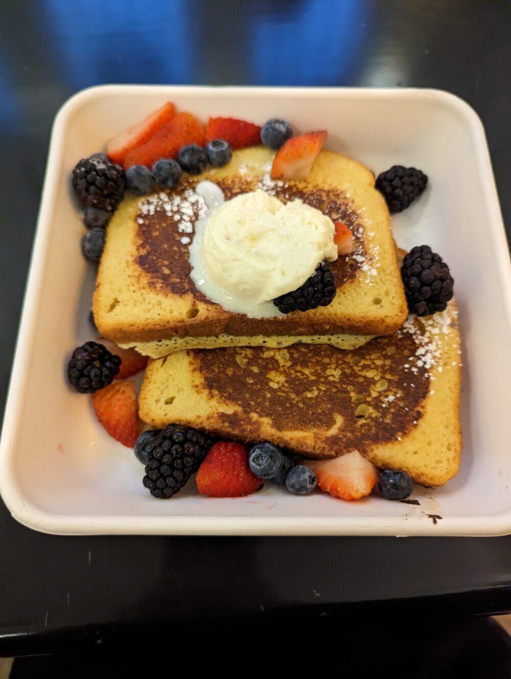 french toast with butter and fruit