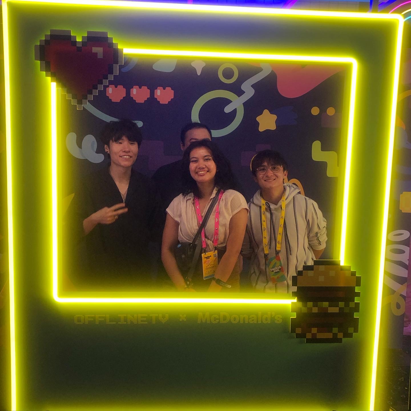 me posed behind a neon sign with DisguisedToast, Scarra, and Michael Reeves