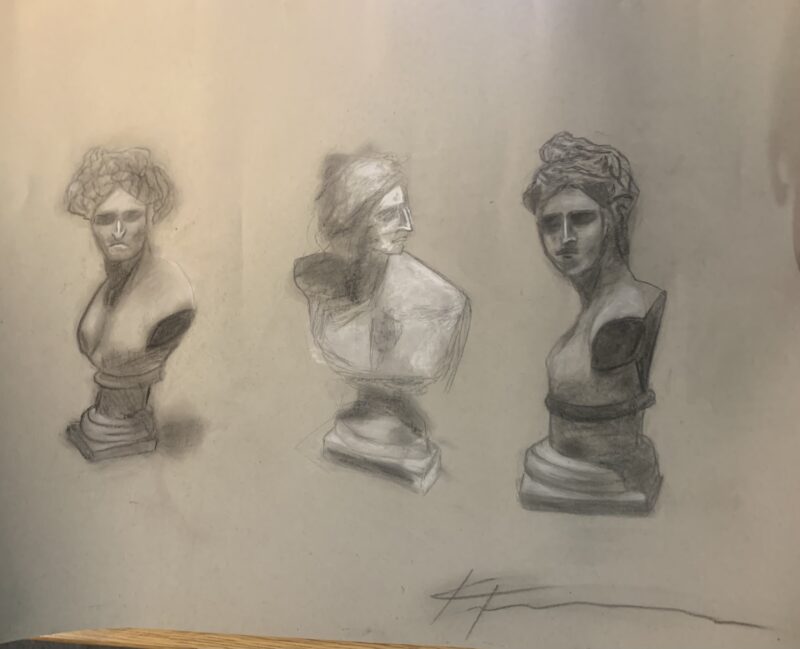 drawing of 3 marble heads