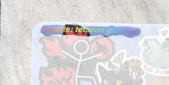 update tetazoo glounge written in rainbow font
