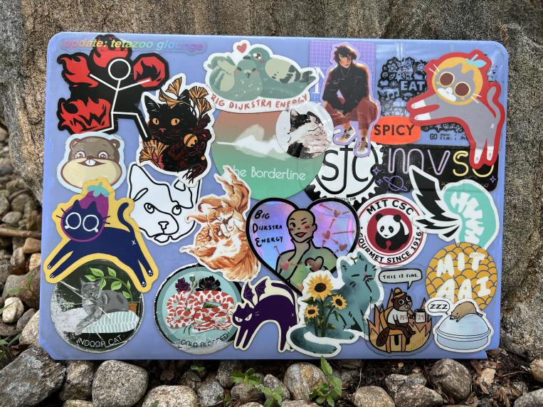 picture of my laptop filled with stickers
