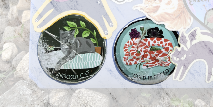 stickers read "indoor cat" and "cold blooded", which features a snake adorned by flowers