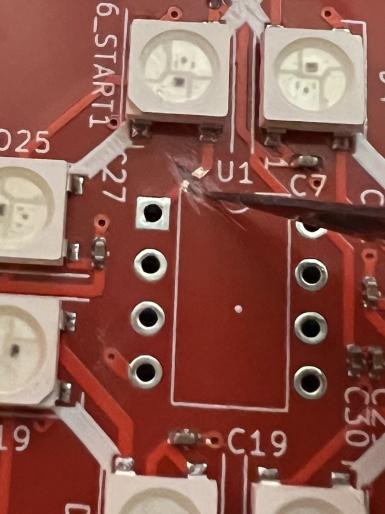 using an exacto knife to scrape off the trace