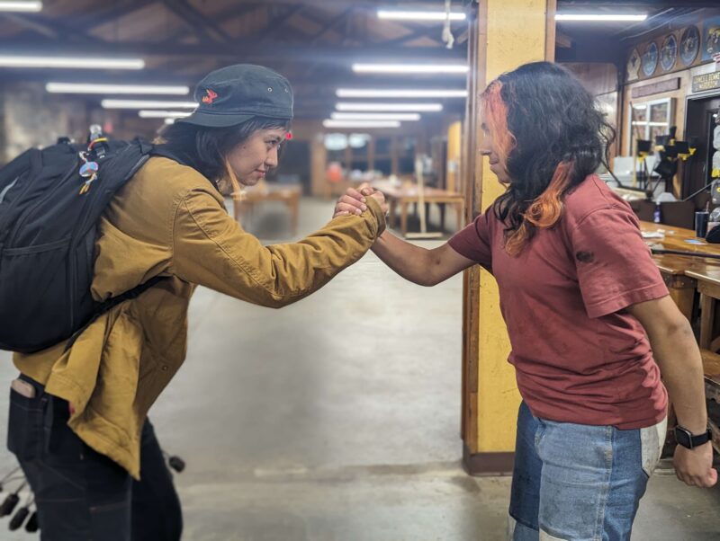 two people shaking hands