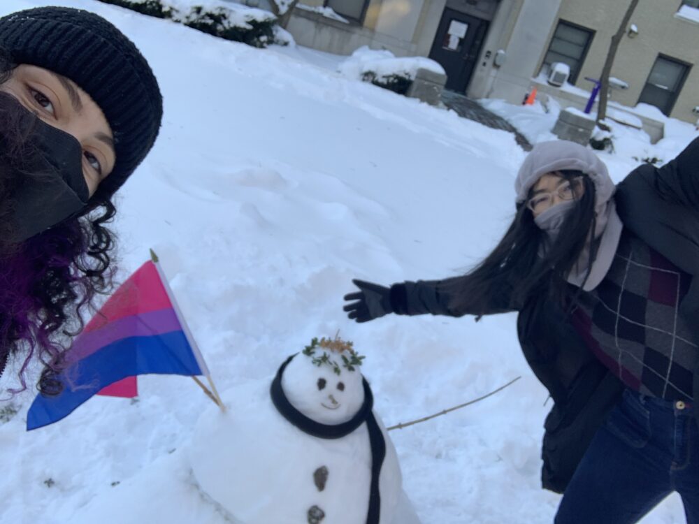 2 girls and a snowman