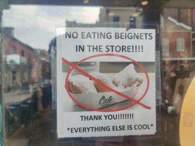 NO EATING BEIGNETS IN THE STORE