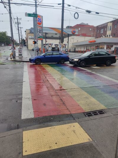 a rainbow painted sidewalk in capitol hill