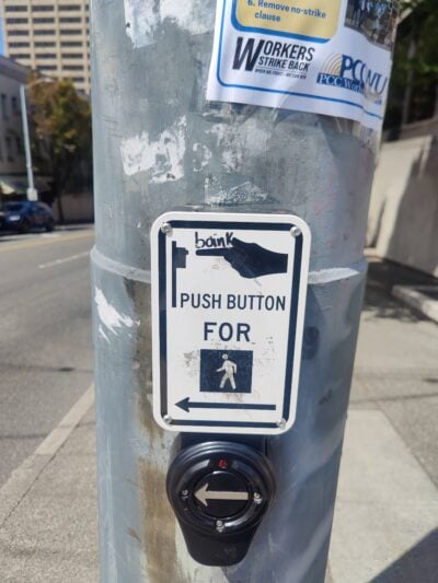 boink written on push for crosswalk button